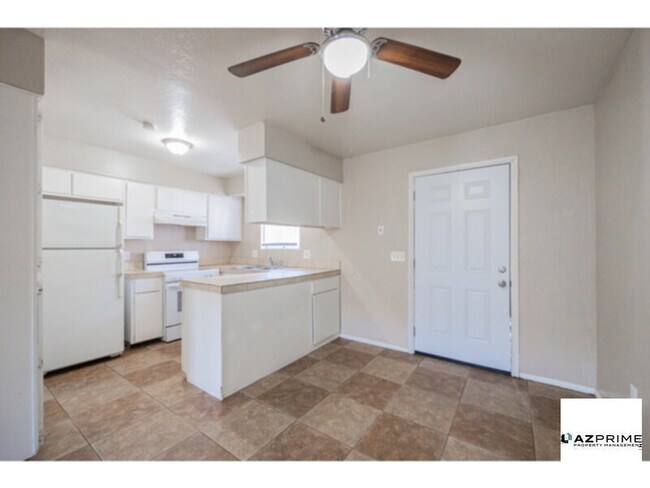 Building Photo - Experience the Perfect Haven in this Delig...