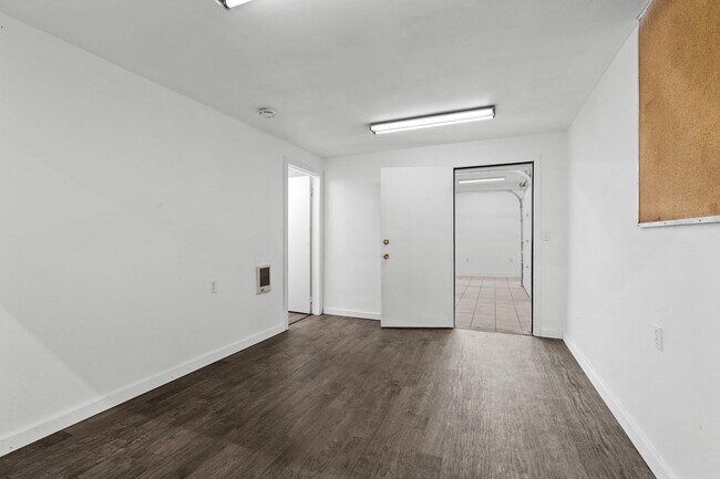 Building Photo - Stunning Home and Three Bay Shop Along Spo...