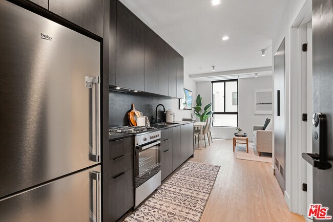 Building Photo - 3688 Overland Ave