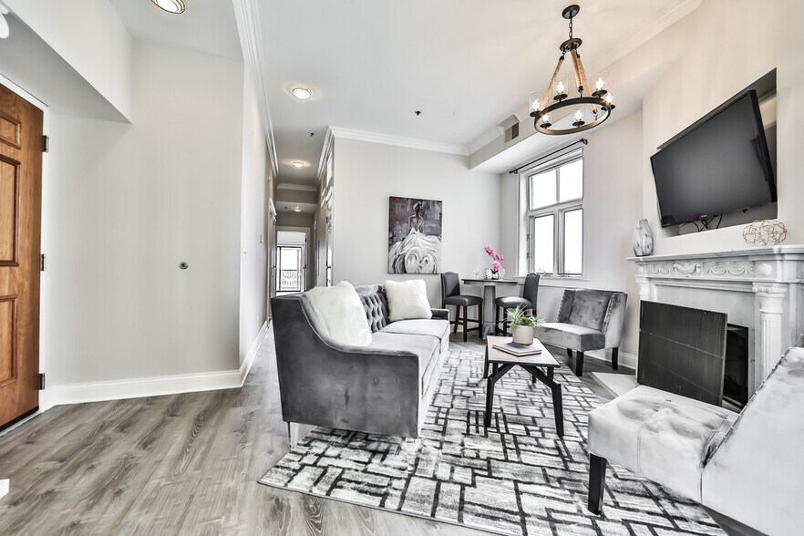 Living room with gas fireplace - 2042 N Clark St