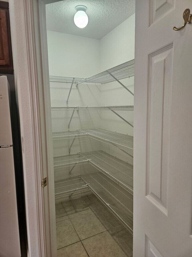 Building Photo - 4 BEDROOM 3 FULL BATH HOME WITH A SCREENED IN POOL IN THE BEAUTIFUL PALM COAST