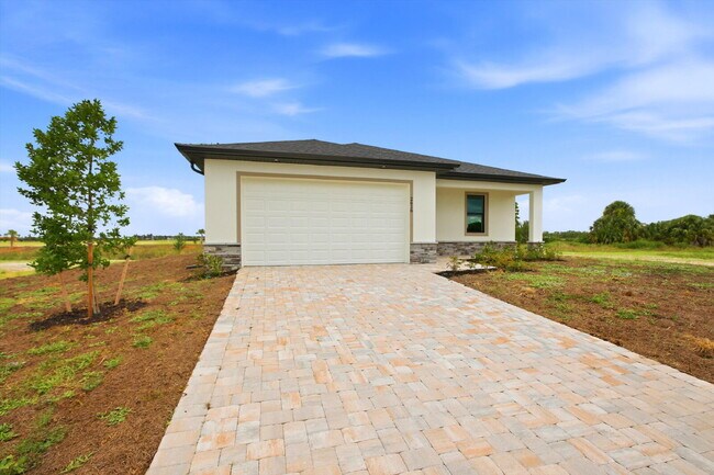Building Photo - New Construction 3/2 Pool Home on Canal, $2,699, NW Cape Coral. The Only Thing Used Here Is the W...