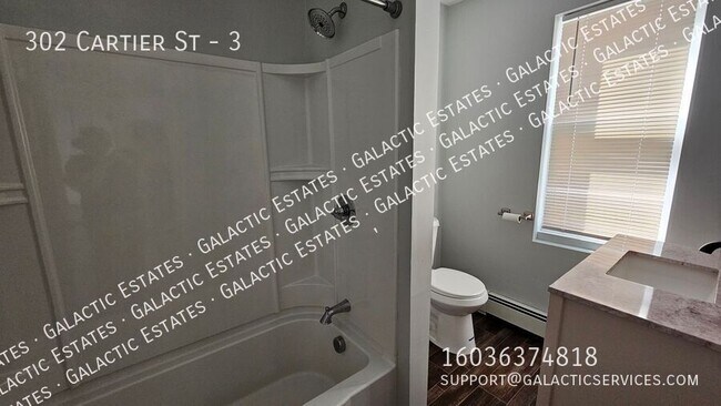 Building Photo - 302 Cartier St