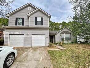 Building Photo - 3 Bed, 2 Bath Home with Fenced Yard & Garage / Pet-Friendly / Available Now!