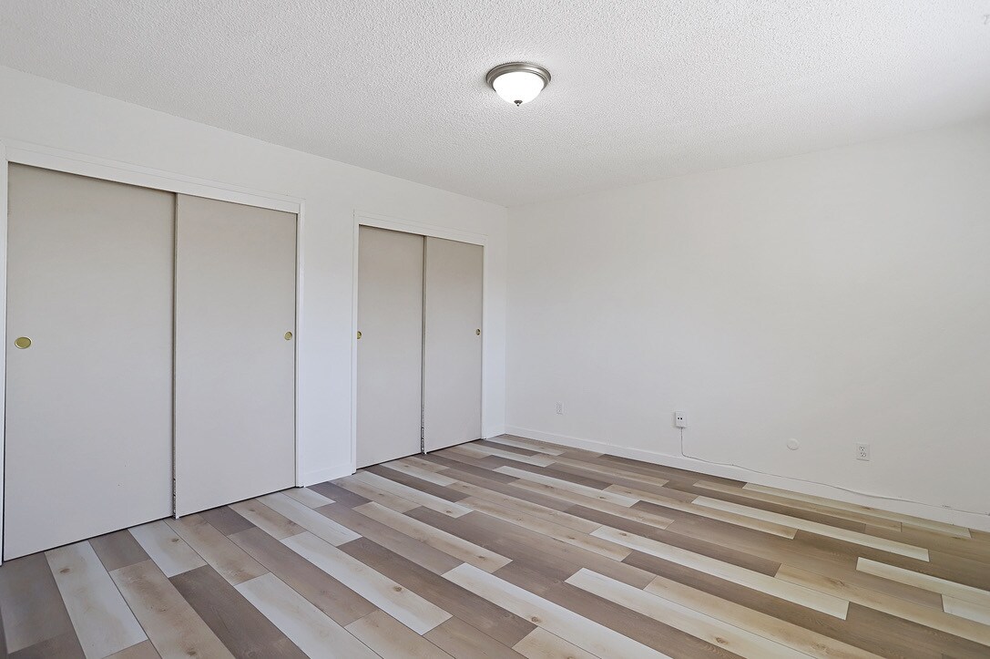 Bedroom 1 with Large Closets - 1305 Sylvan Meadows Dr