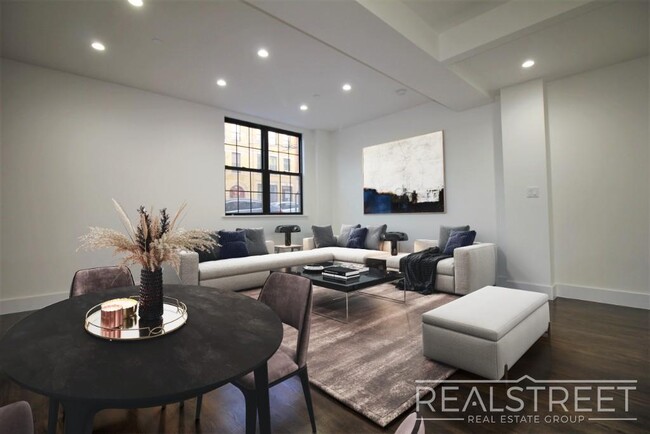 Building Photo - Stunning Giant New 2 BED with GARAGE & W/D...