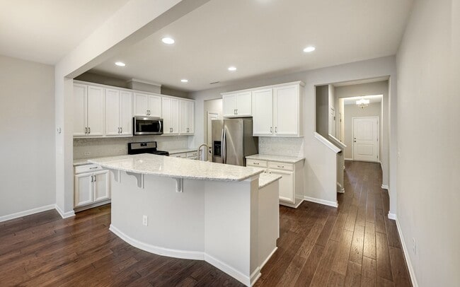 Building Photo - Contemporary, spacious 3-bedroom, 2.5-bath...