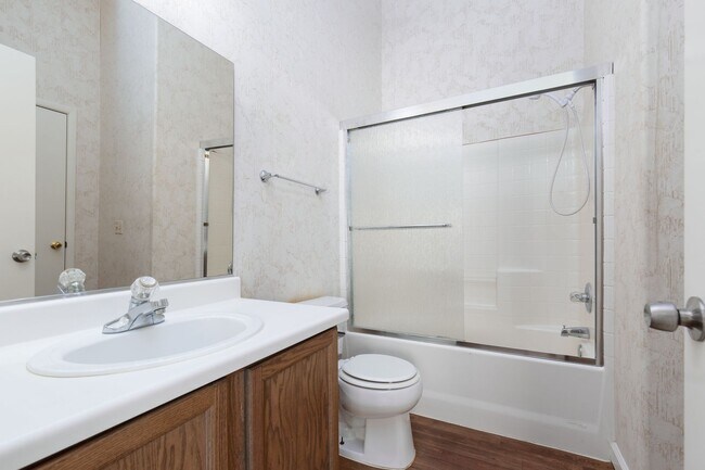Building Photo - Two bedroom townhome with garage in gated ...