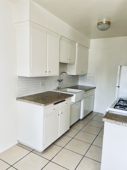 Farm Sink, granite counter top - 219 N Buena Vista St