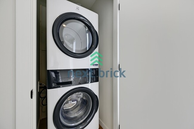 Building Photo - Brand-New 2026 Townhome | 3 Bed | 2.5 Bath | 1,560 Sq Ft | EV Garage | A/C Included