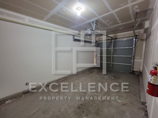 Building Photo - Spacious 3/2.5 Located In Communication Hills, With Two 1 Car Garages, W/D & Large Master Retreat