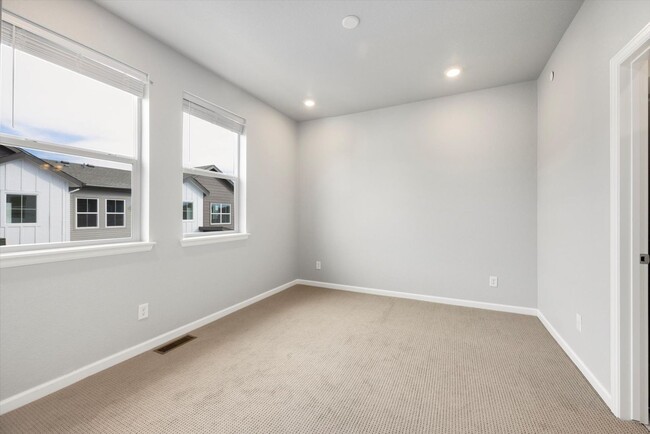 Building Photo - Gorgeous NEW Three Story Townhome with two car attached garage!