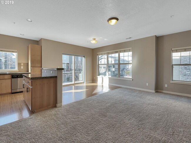 Building Photo - 2BR + 2.1BA Corner Townhome-Style Condo — Dual Primary Suites, Attached Garage & Most Utilities I...