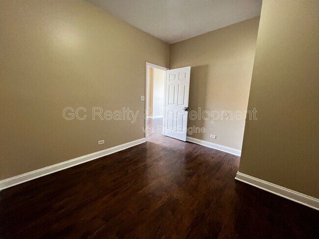 Building Photo - 7642 S Normal Ave