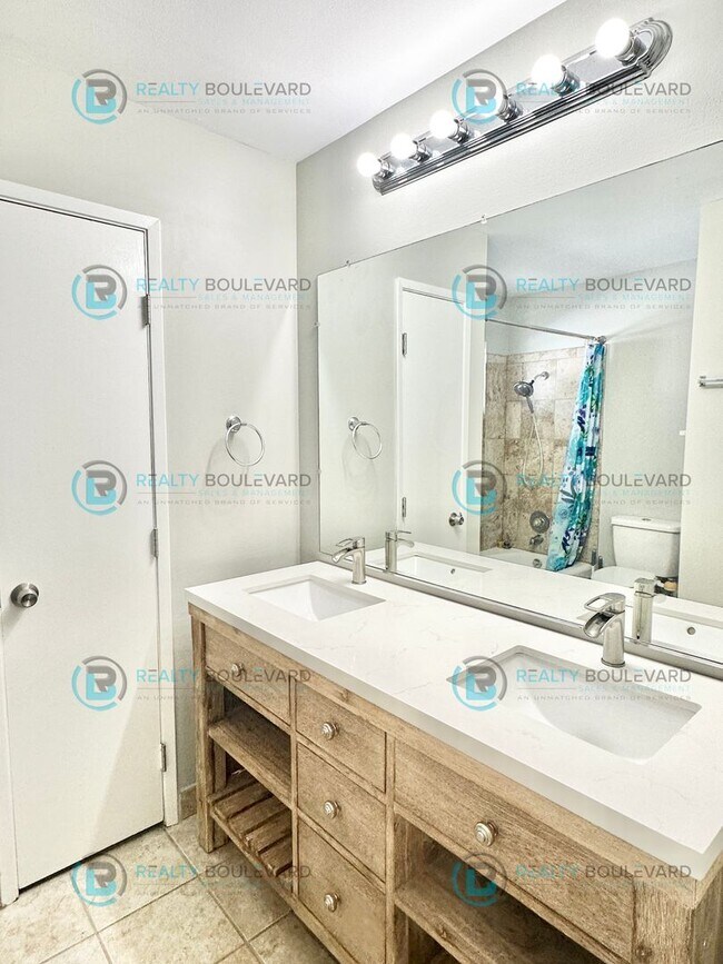 Building Photo - 2-bed, 2-bath, 2-story townhome with pool and park like setting outside the front door.