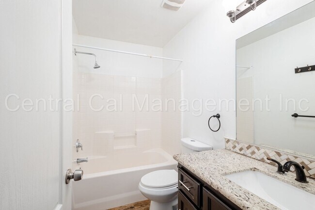 Building Photo - 4 Bedroom/2 Bath Home with Paid Solar - $2...