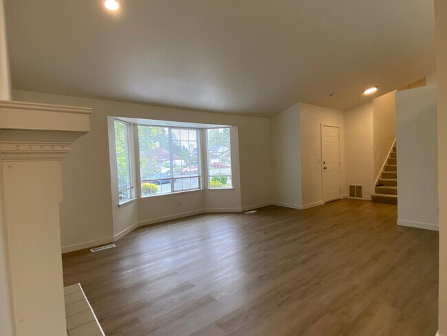 Building Photo - Stylishly Renovated Home with Private Back...