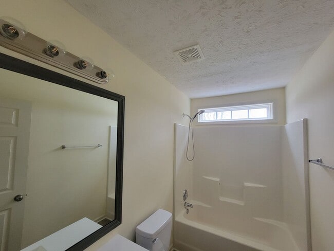 Building Photo - Lake Front Property. Loft - Swim/Tennis - Stainless Steel Appliances