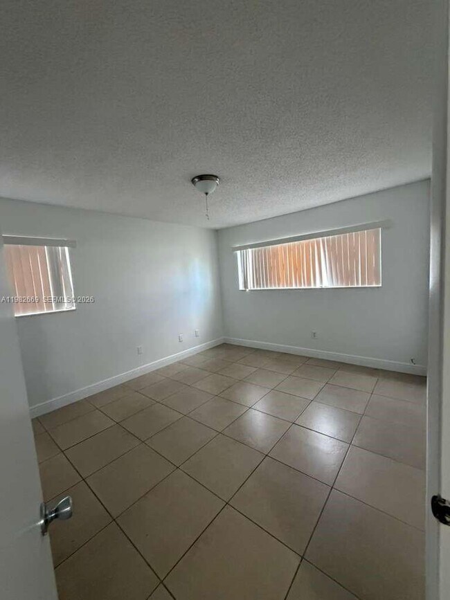 Building Photo - 9723 Hammocks Blvd