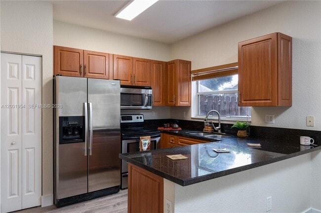 Building Photo - 12722 SW 49th Ct