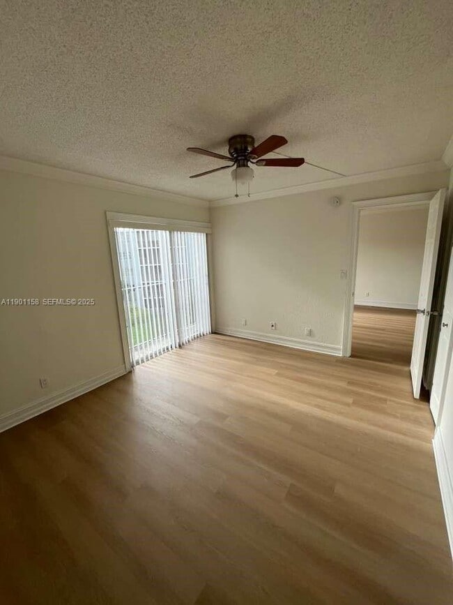 Building Photo - 8740 N Sherman Cir