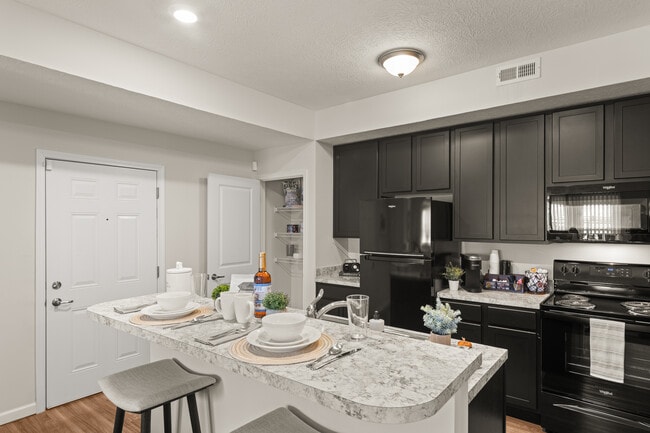Building Photo - The Residences at Golf Village