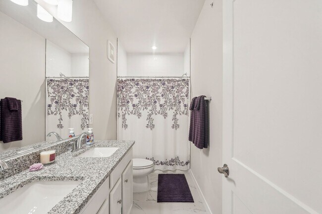 Building Photo - The Julianne is modern, functional, and full of charm—don’t let it get away!