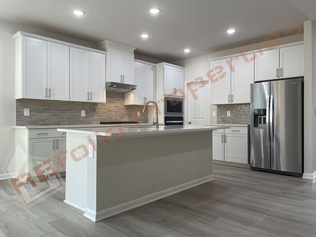 Building Photo - Beautiful Brand New 4 Bedroom, 2.5 Bathroo...