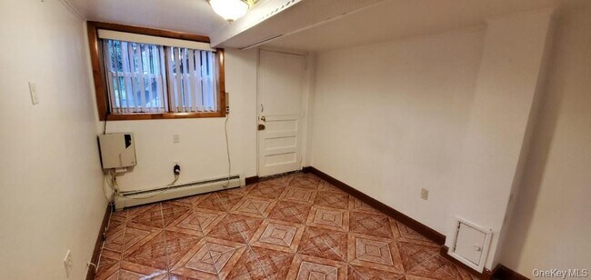 Building Photo - 25-36-36 76th St