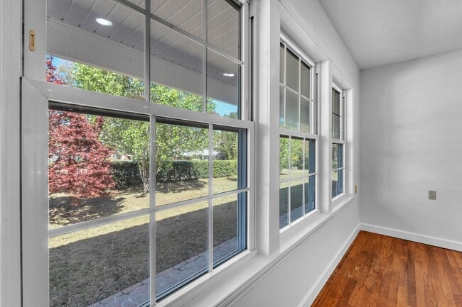 Building Photo - Charming home with large garage & attached...