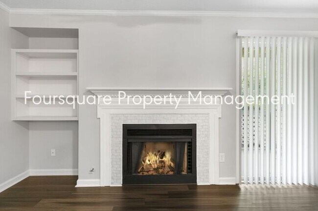 Building Photo - Charming 1st-Floor End-Unit Condo with Gas Log Fireplace, Private Back Porch & Community Pool – T...