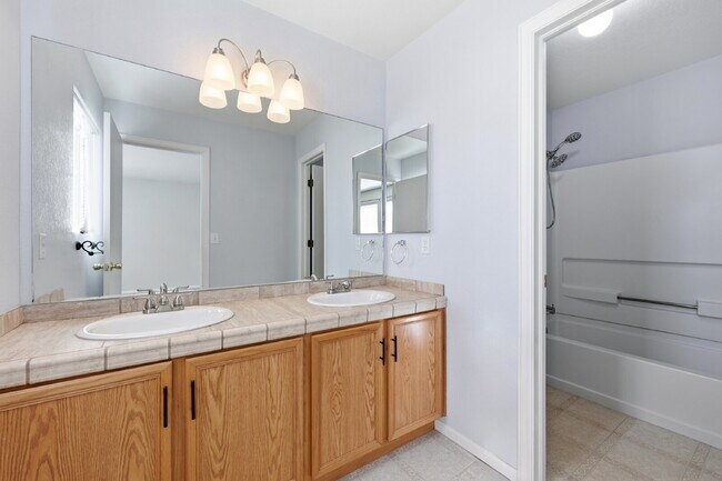 Building Photo - $1,945.95 - 2 Bed, 2.5 Bath Townhome in Colorado Springs with Attached Garage!
