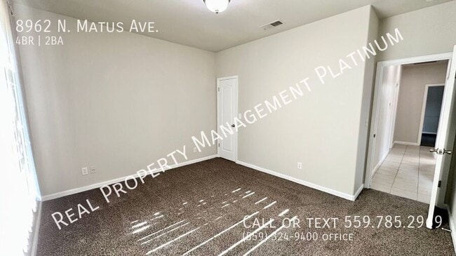 Building Photo - 8962 N Matus Ave