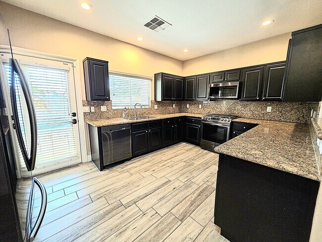 Building Photo - Three-bedroom Single Family