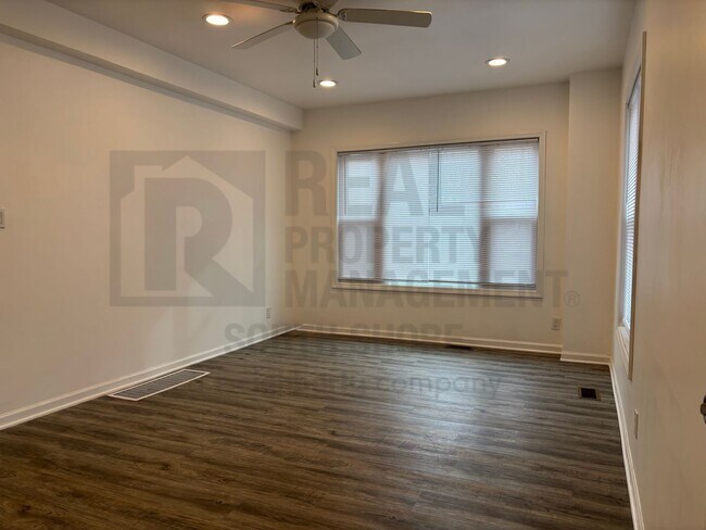 Building Photo - 2104 E 73rd Ave