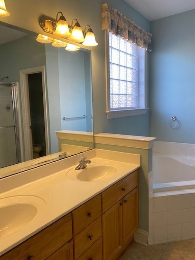 Building Photo - Magnolia Greens - Leland