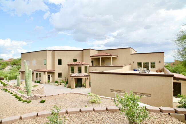 Building Photo - Mountain and City Views from this Furnishe...