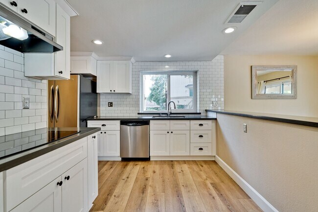 Building Photo - Welcome Home!!! - Modern and Spacious Gem!...