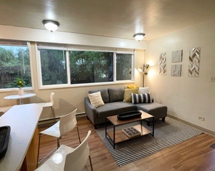 *Note* Flooring or coloring may vary slightly as the photo is of an identical downstairs unit. - 2176 W 15th Ct
