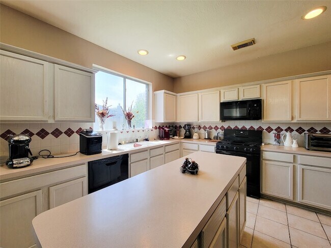 Building Photo - 8002 Weeping Willow Pl