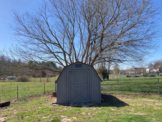 Building Photo - **Backyard offers County Setting in City L...