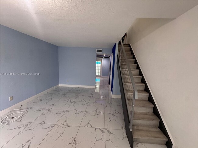 Building Photo - 3977 W 9th Ln