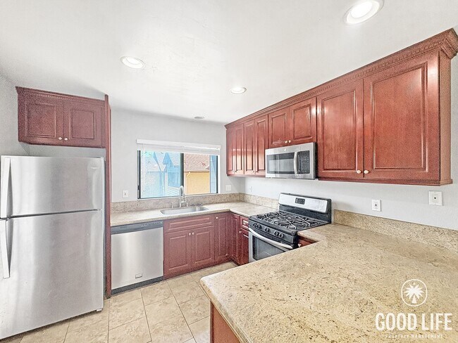 Building Photo - Light-Filled 2BD/2BA Top-Floor Condo in Mira Mesa with Granite Kitchen, Private Balcony & Pool