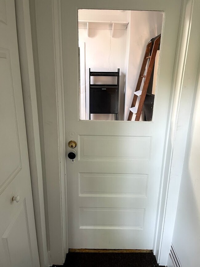 Deadbolt door to Private Studio - 3 E Slade St
