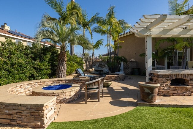 Building Photo - Coastal Retreat in La Costa - Spacious Home with Backyard Oasis