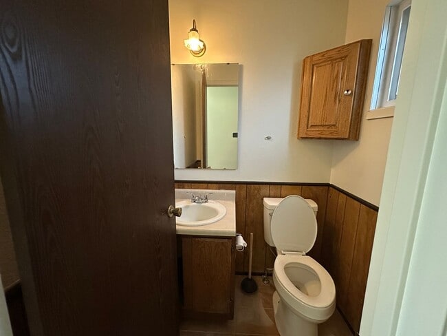 Building Photo - Spacious, three level, 4 Bed 2.5 bath Townhome in Ammon right behind the Walmart on Hitt.