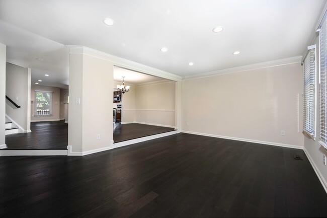 Building Photo - Spacious Bright and Beautiful End Unit Tow...