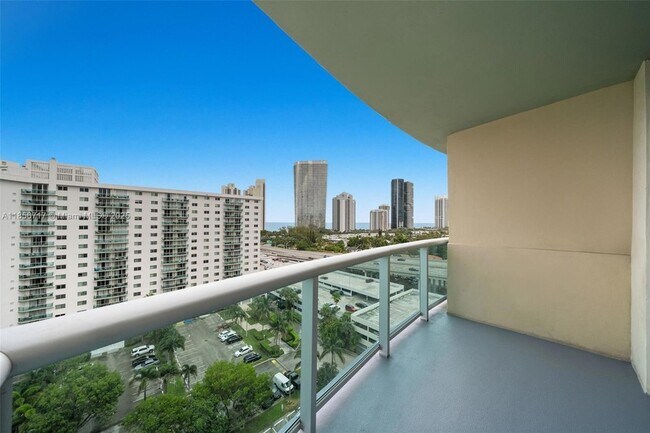 Building Photo - 19390 Collins Ave