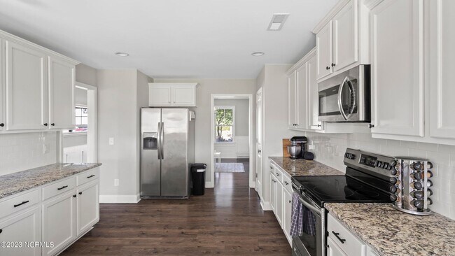 Building Photo - 4BR Home in The Landing at Mill Creek | Bonus Room + Fenced Yard w/ Pergola