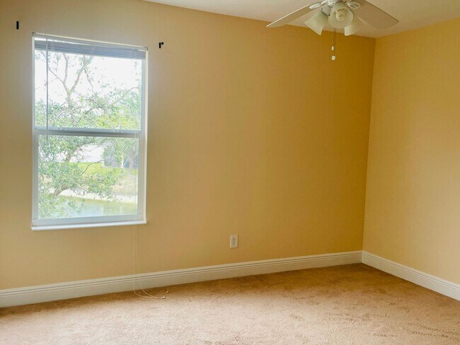 Building Photo - **SUNCOAST LAKES GATED COMMUNITY**